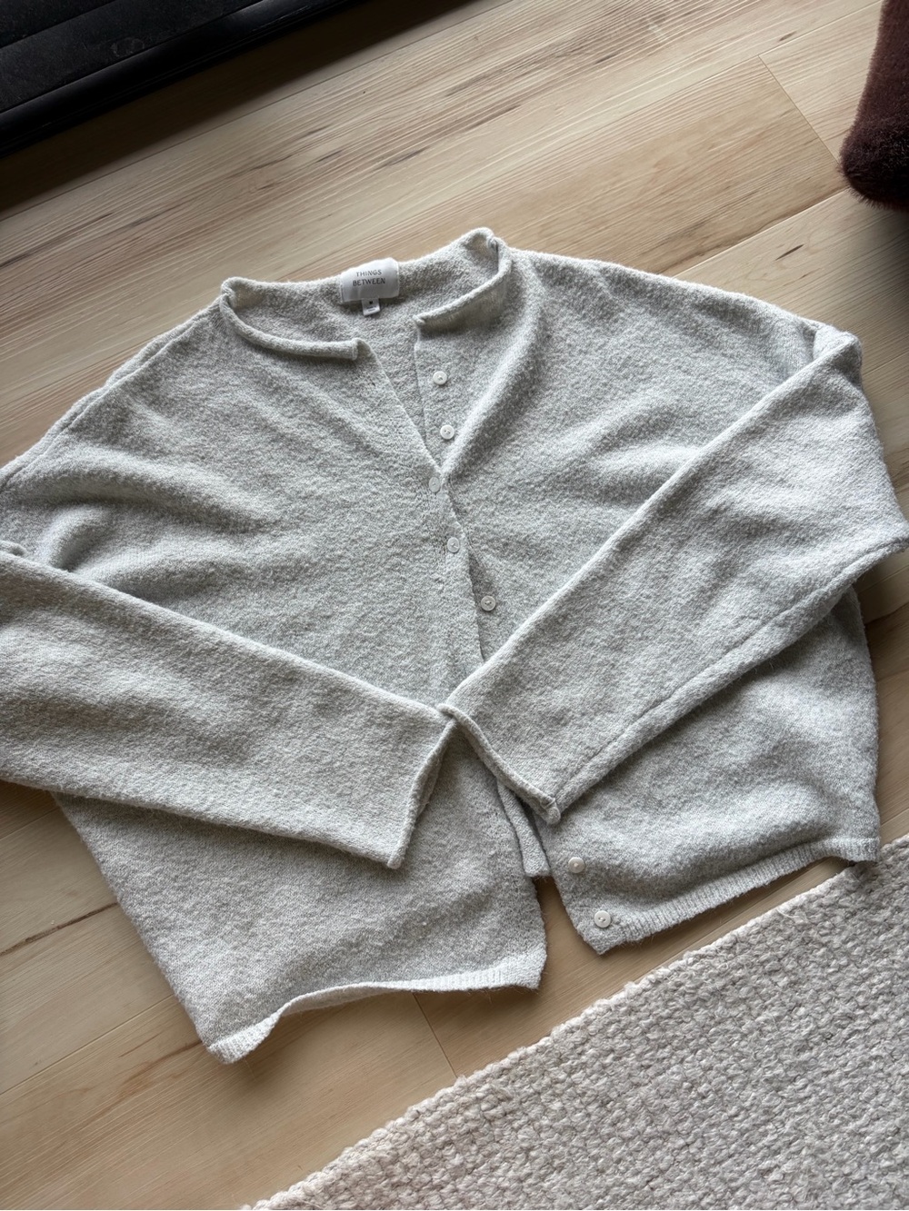 Gray things between cardigan